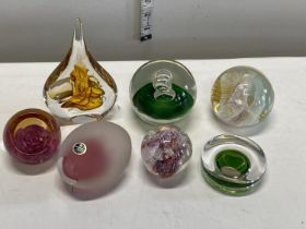 A selection of assorted paperweights including Caithness and other signed paperweights