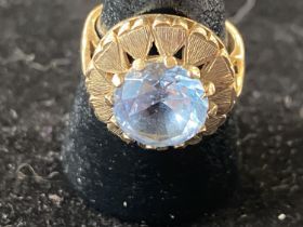 A 9ct gold and blue stone ring 7.01g. Size O