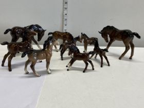 Nine assorted Beswick foals figurines, one foal with repair to leg.