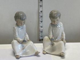 Two Nao figurines