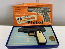 A boxed vintage Bell Toy Junior 45 automatic pistol, shoots plastic pellets