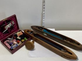 Two vintage wooden shuttles, sewing kit and mushroom