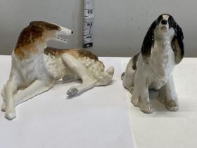 Two Russian Lomonosov dog figurines