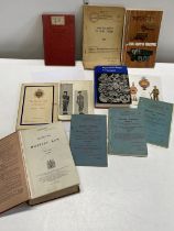 A selection of military related books etc