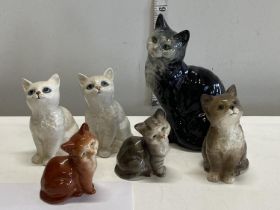 Seven assorted Beswick cat figurines