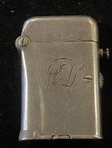 A vintage Thorens Teleflam lighter with monogram to front