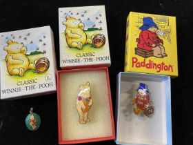 Three boxed vintage Paddington Bear brooches