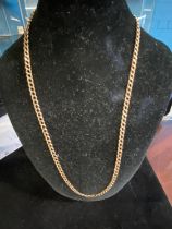 A 9ct gold necklace 11.26g. Chain length 56cm overall.