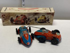A boxed PN Western Germany pair of tinplate clockwork cars no. 260 in working order