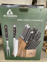 A boxed ACOQOOS all in one 17 piece knife set (unchecked)