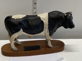 A Beswick Friesian bull figurine