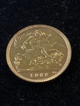 A 22ct gold half sovereign dated 1982