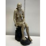 A large resin sculpture of a nude female h57cm, shipping unavailable