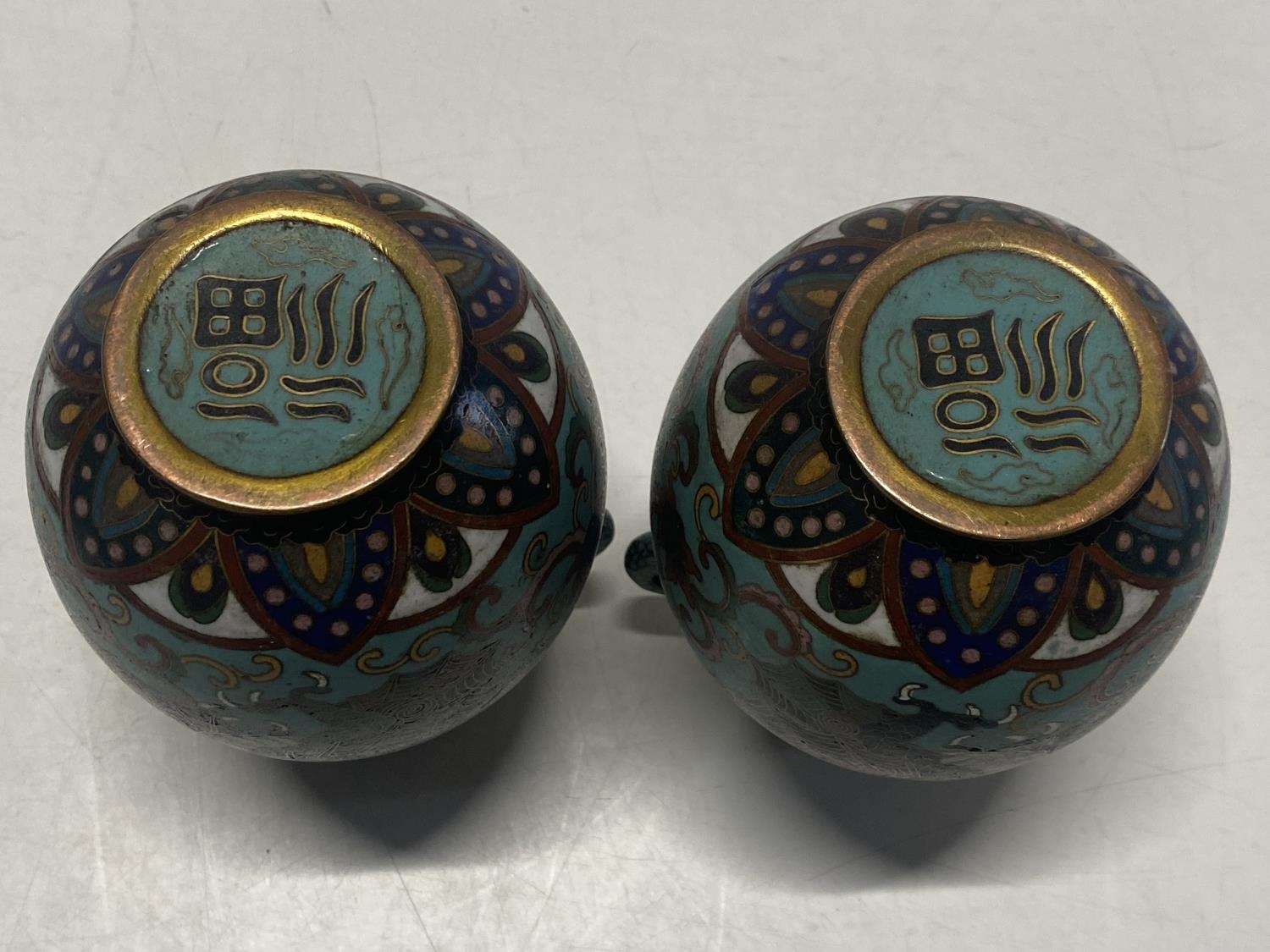 A pair of Chinese early 20th century Cloisonne vases with dragon decoration, signed to the base - Image 2 of 2