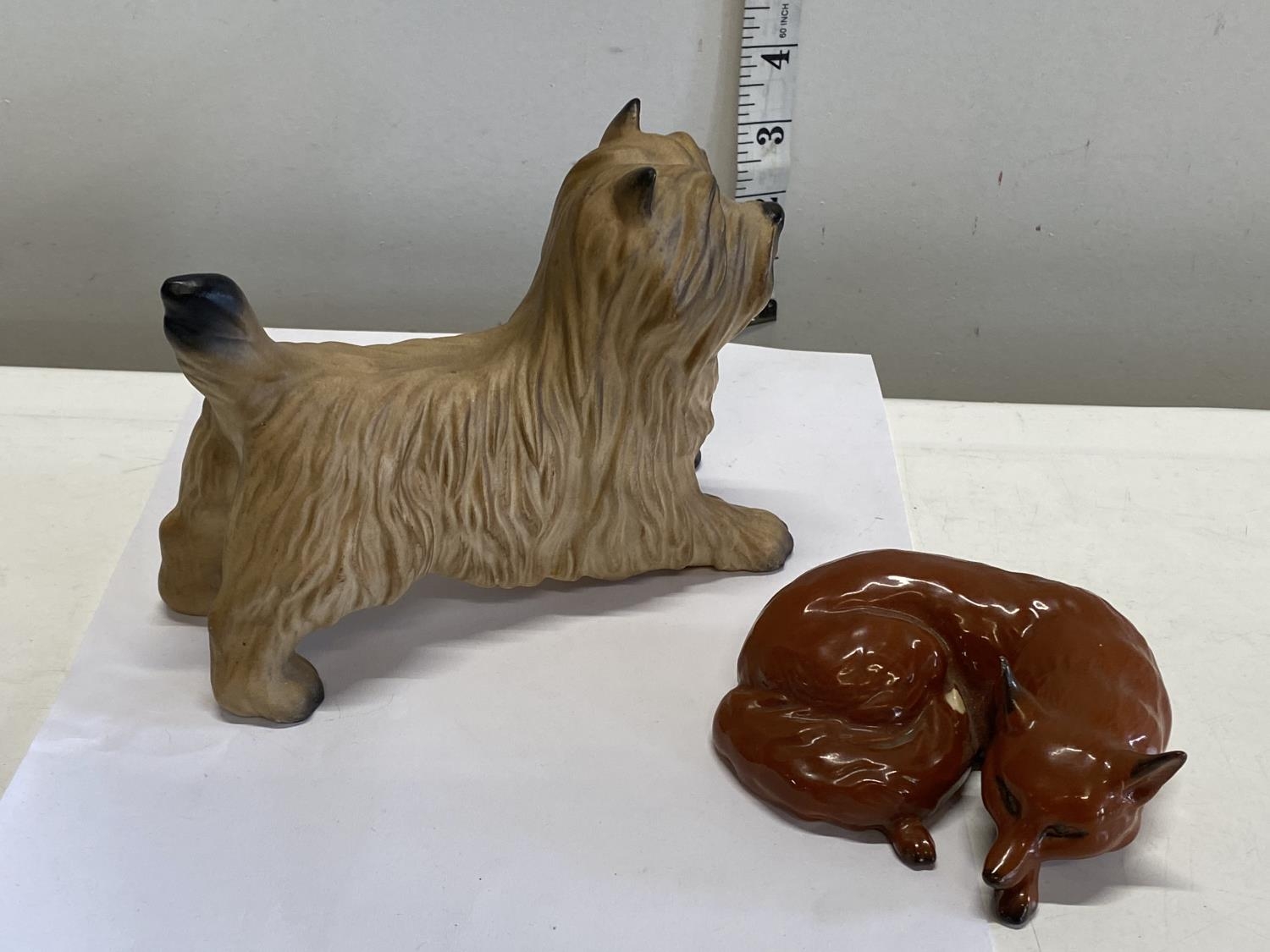 A Beswick dog and Beswick fox figurine