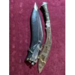 A sheathed vintage Kukri knife, UK shipping only