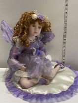 A large Leonardo porcelain doll