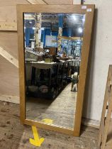 A large oak framed mirror, 135x74cm, shipping unavailable