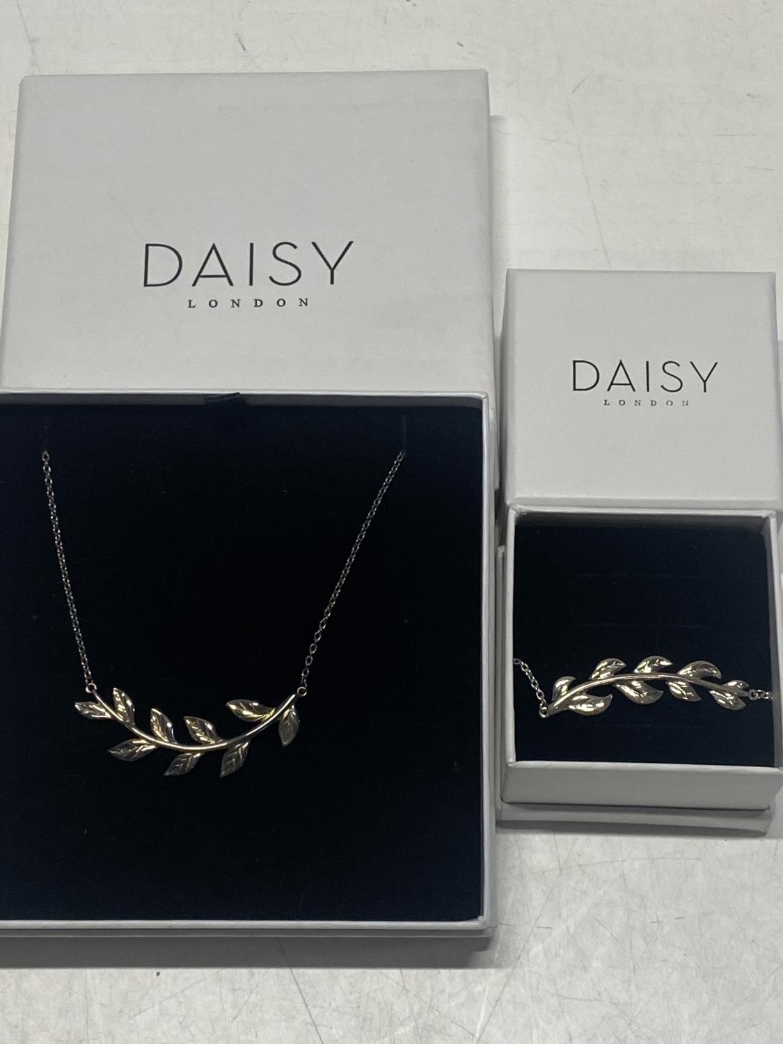 Two boxed Daisy 925 silver pieces of jewellery