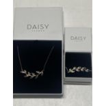 Two boxed Daisy 925 silver pieces of jewellery