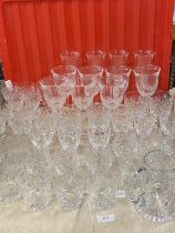 A large selection of cut glass crystal including decanters, shipping unavailable