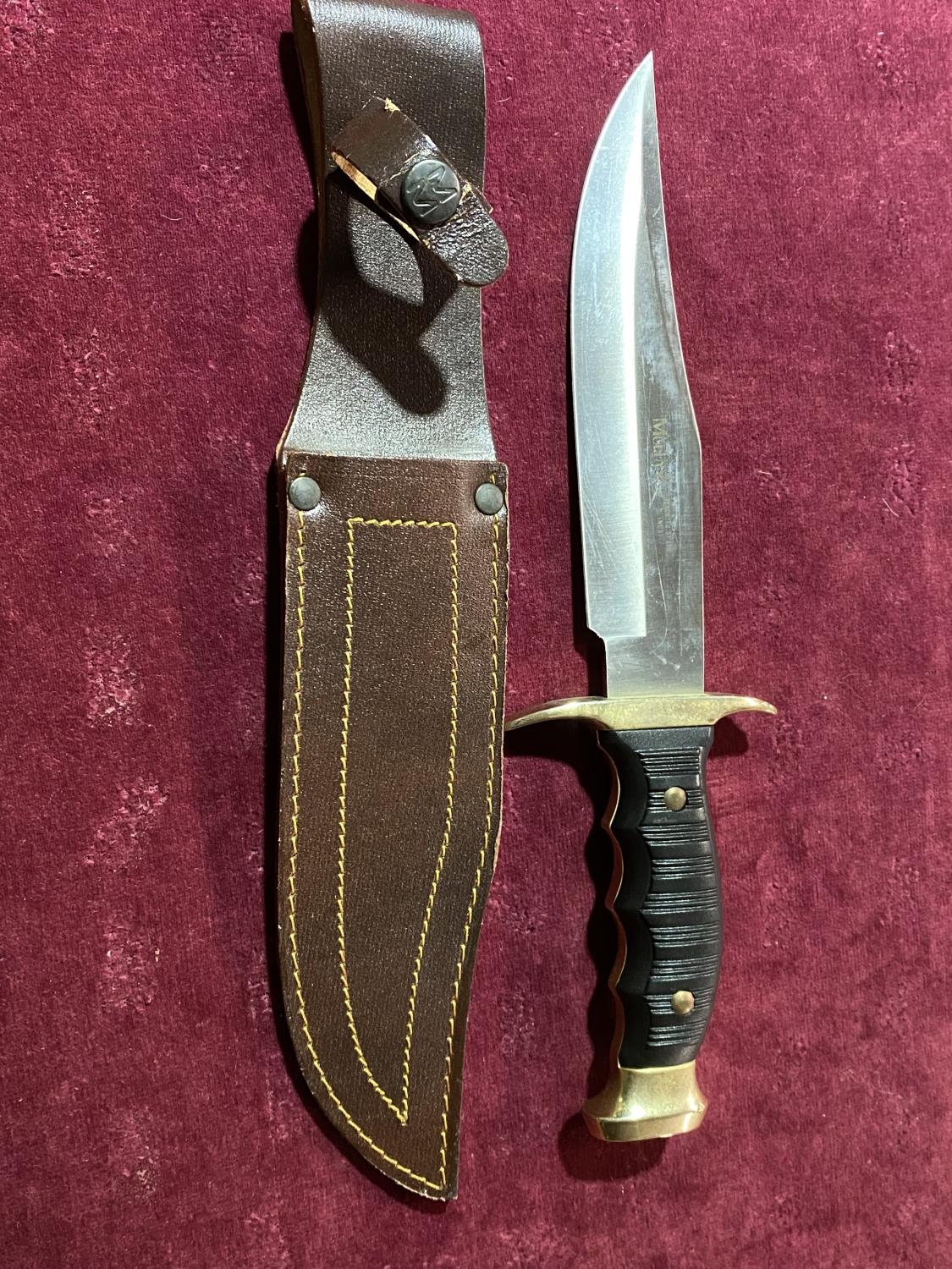 A Spanish made bowie style knife with sheath blade length 18cm, UK shipping only