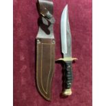 A Spanish made bowie style knife with sheath blade length 18cm, UK shipping only