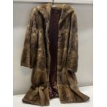 A vintage ladies longline fur coat