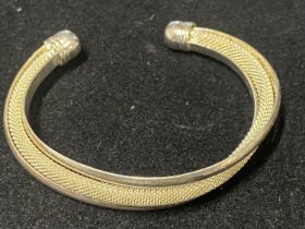 A stamped 925 silver bangle