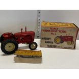 A boxed Lesney major scale series no 1 Massey-Harris tractor. Damage to box