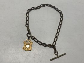 A base metal Albert chain and fob