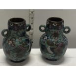 A pair of Chinese early 20th century Cloisonne vases with dragon decoration, signed to the base