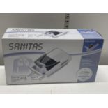 A boxed Sanitas nebulizer (unchecked)