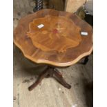 A small occasional table with inlaid decoration, H67cm, shipping unavailable