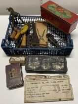 A job lot of assorted vintage hand tools, vintage tins etc