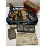 A job lot of assorted vintage hand tools, vintage tins etc