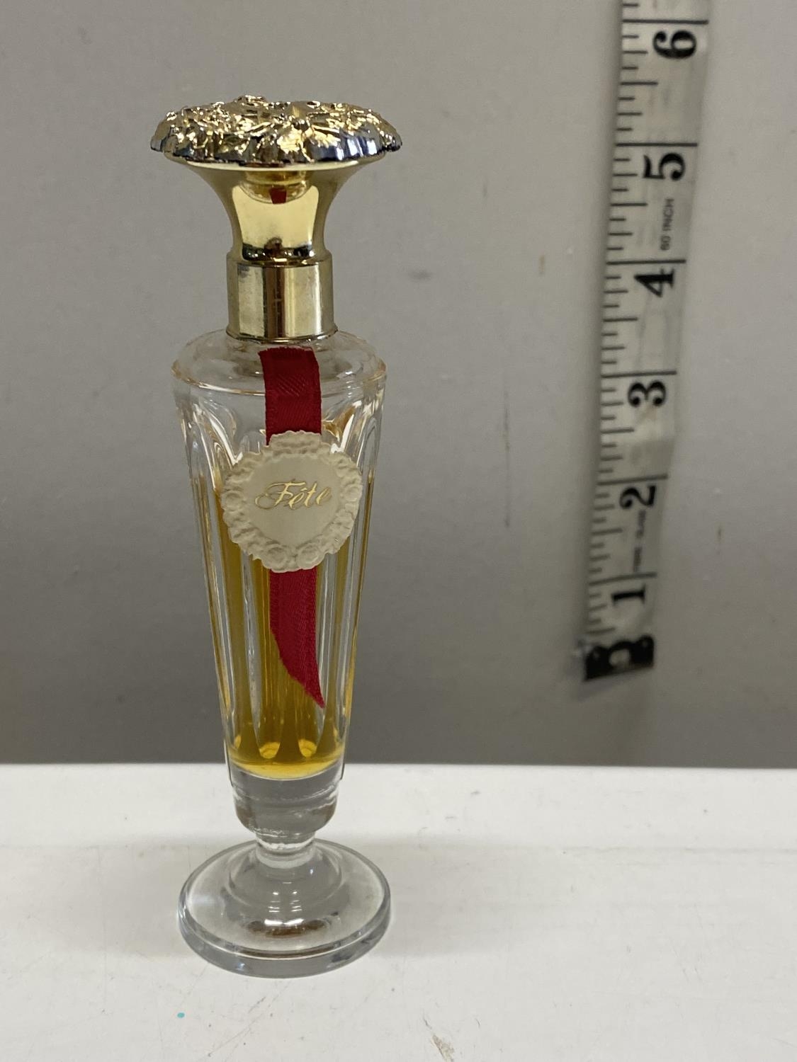 A bottle of Fete perfume (slightly used)