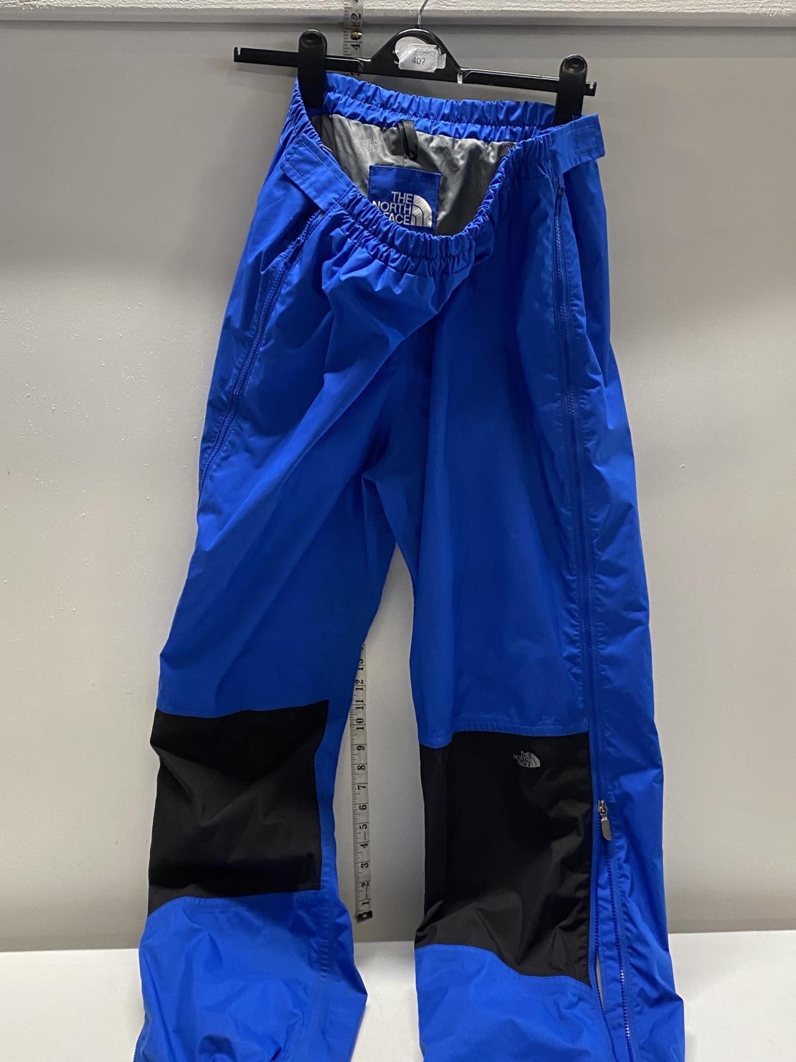 A pair of Northface waterproof trousers size XL