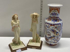 A vintage Oriental vase and two resin lady figurines