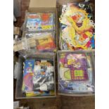 Two boxes of assorted vintage McDonald's happy meal boxes and other McDonalds accessories