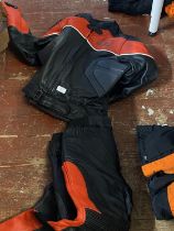 A set of Euro leather motorbike trousers and jacker size 42