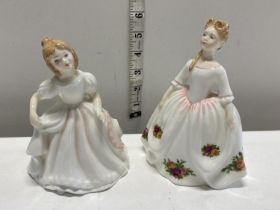 Two small Royal Doulton lady figurines