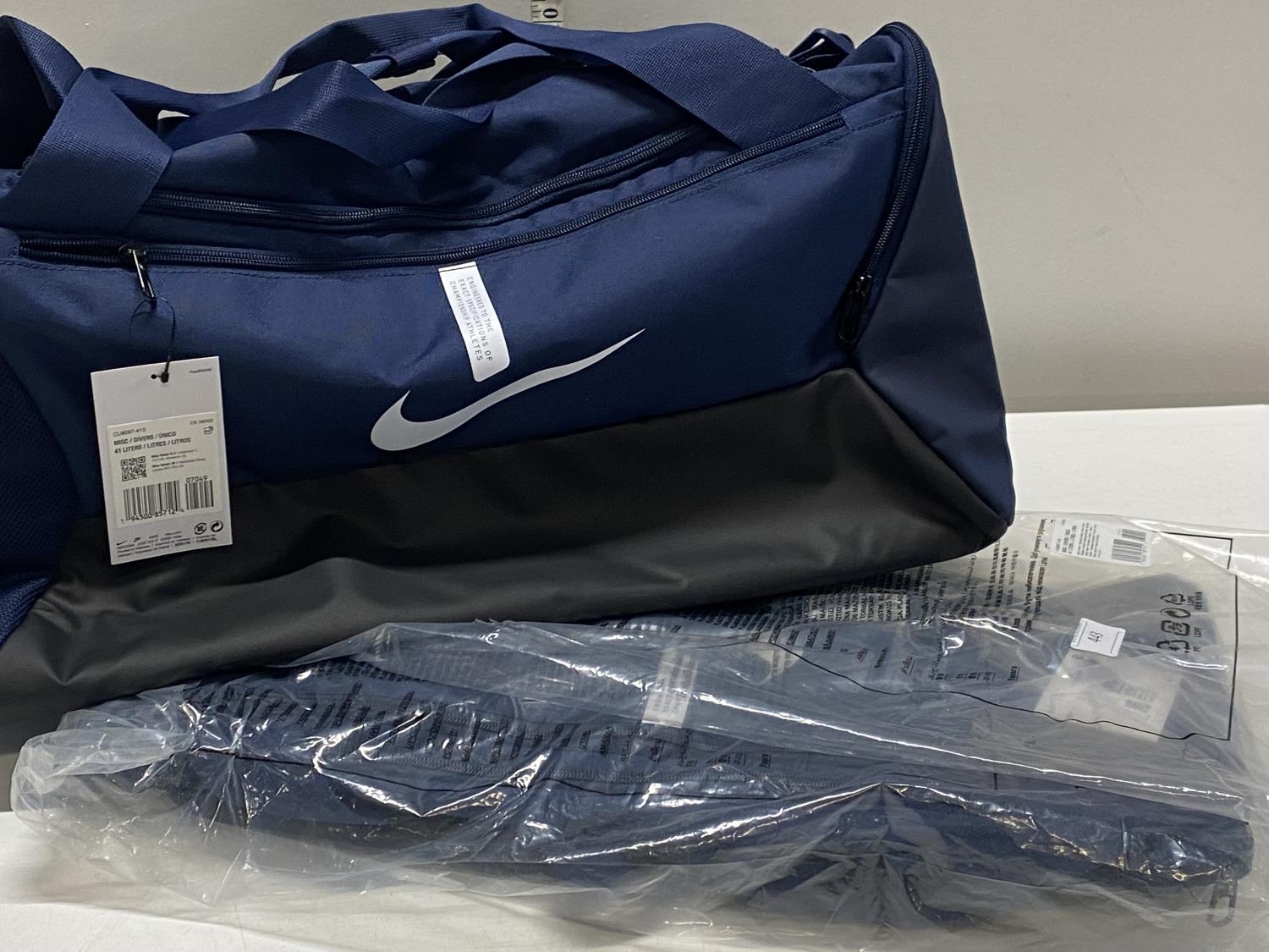 Two new Nike holdalls