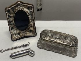 A job lot of hallmarked silver items including small photo framed and cheroot holder case