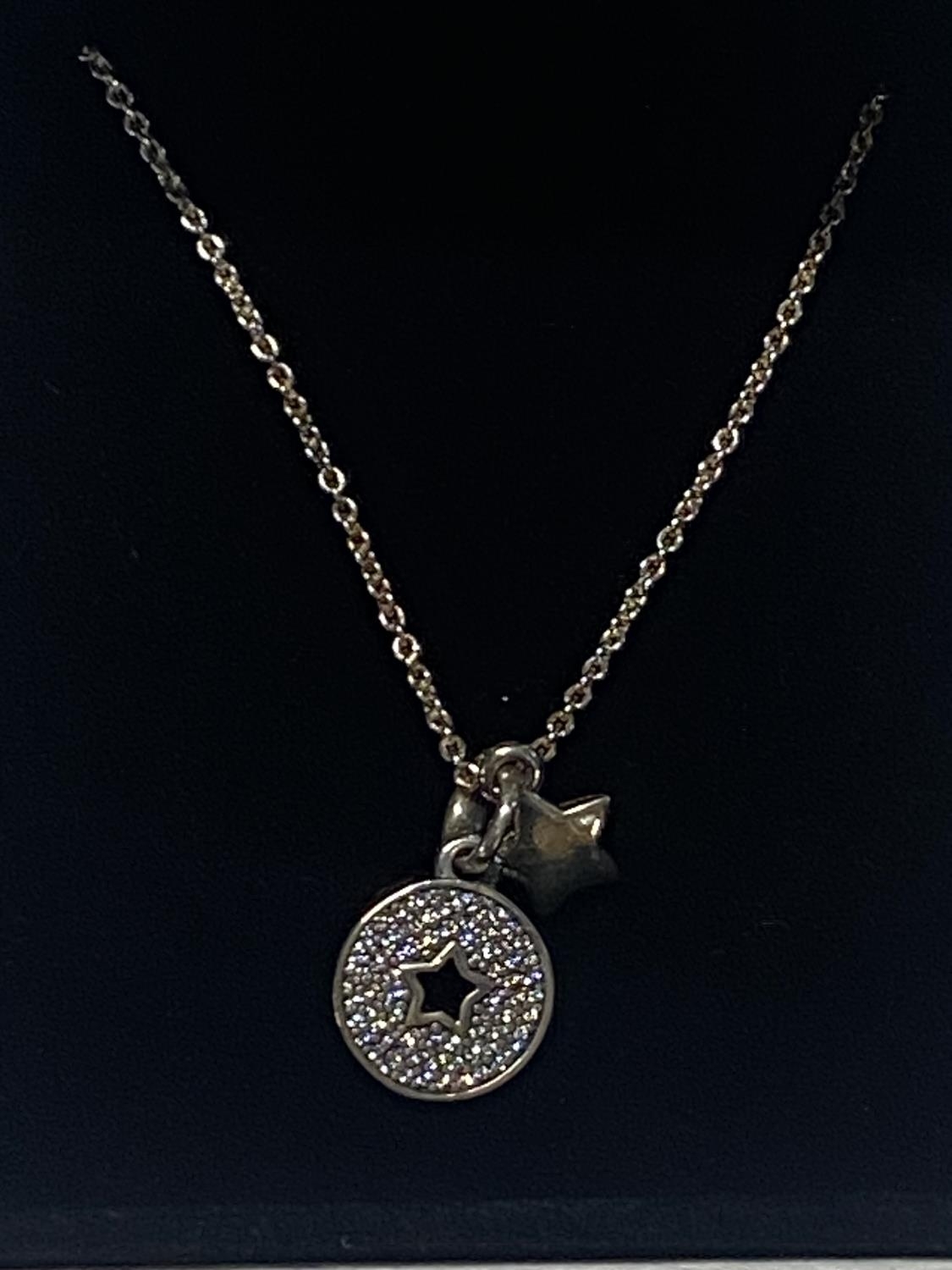 A boxed Pandora necklace and pendant