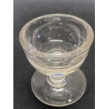 A Victorian penny lick glass