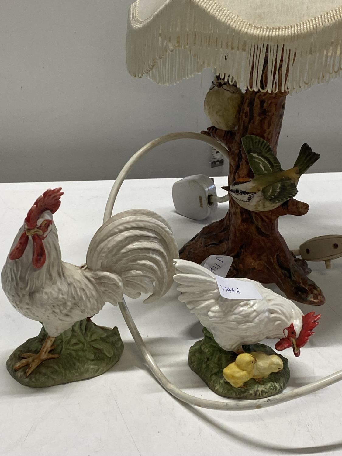 A Goebel lamp shade and two Goebel Cockerel figures