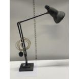 A early vintage Herbert Terry angle poise desk lamp with stepped based, shipping unavailable