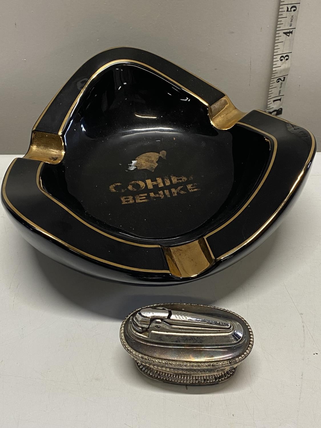 A large vintage Cohiba cigar ceramic ash tray and a Ronson table lighter