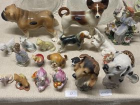 A job lot of assorted figurines including Cooper Craft etc